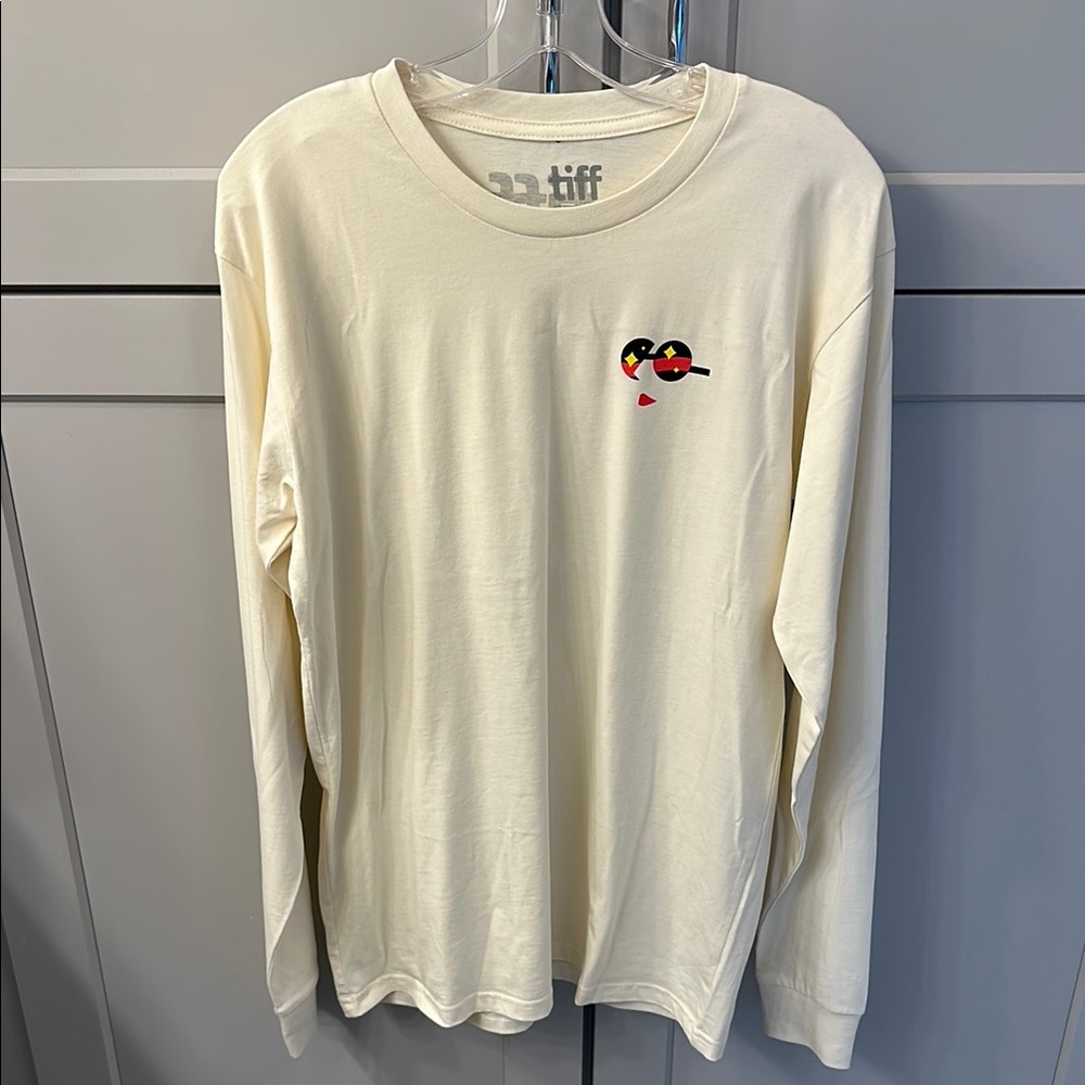 Official Aug 2024 TIFF merch Cream Long Sleeve Shirt